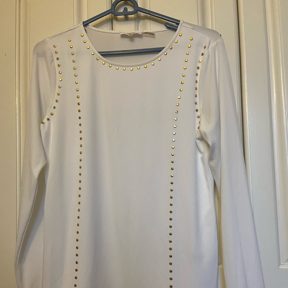 White crew neck shirt with gold studded detail